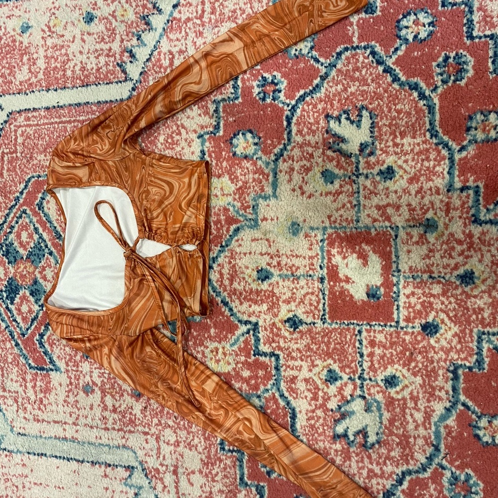 Orange marble design long sleeved from Shein. Size small